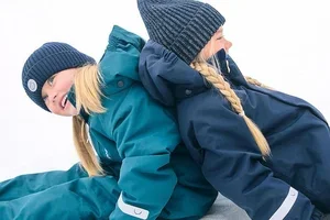 New winter gear. Same adventurous kids.